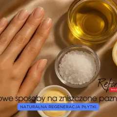 Dłoń z zadbanymi paznokciami obok miseczek z solą, olejkiem i cytryną. Domowe sposoby na zniszczone paznokcie – naturalna regeneracja płytki.