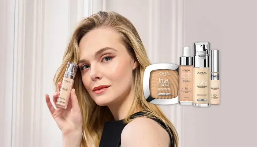 Modelka prezentuje podkład L'Oréal True Match, pokazując, jak dobrać odcień. W tle kosmetyki z tej serii.